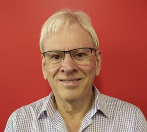 Neil Macgroarty – 20Cube Team Member, posing for a photograph.